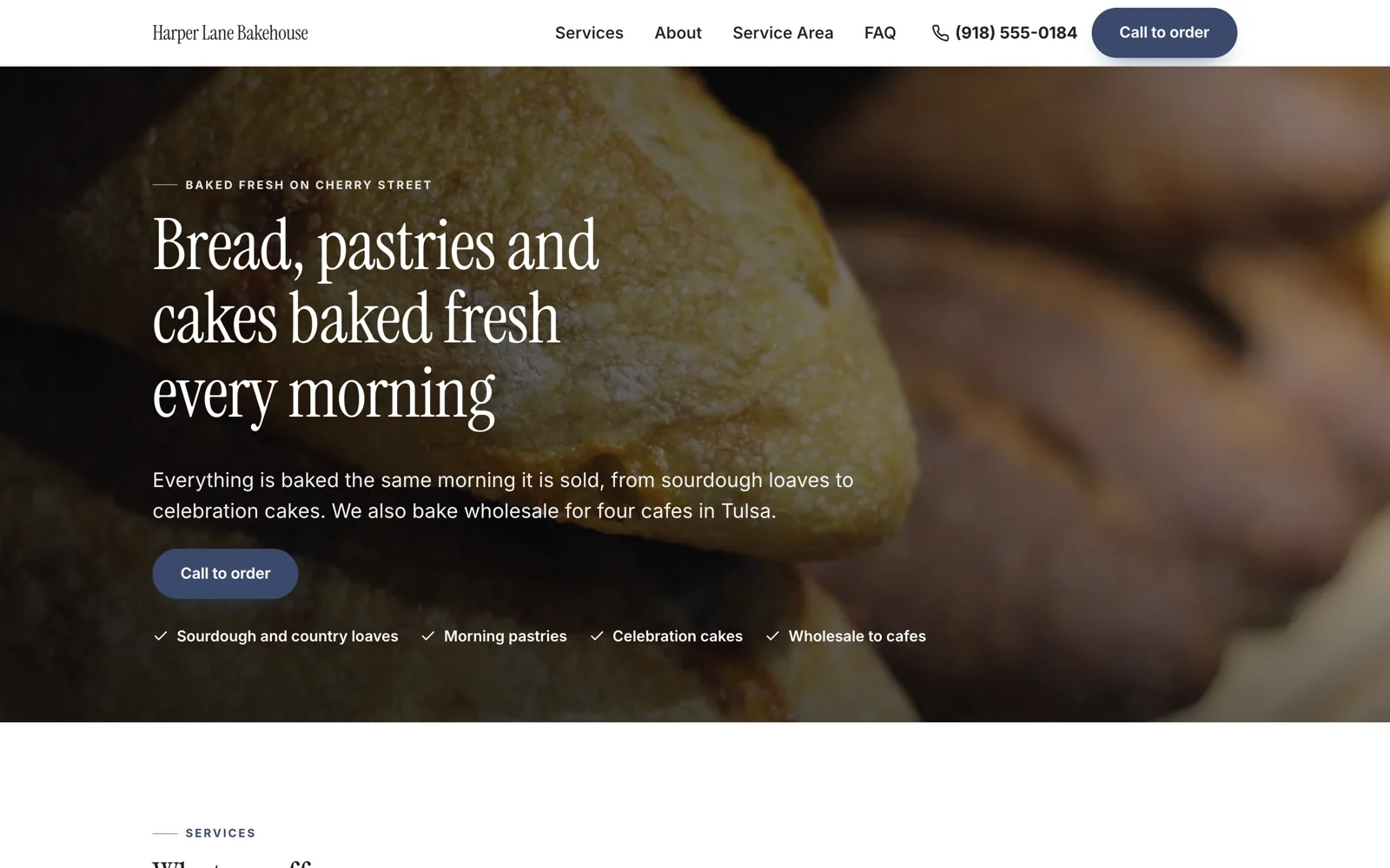The home page of an example bakery site: a dark photograph of fresh loaves behind the heading Bread, pastries and cakes baked fresh every morning, a Call to order button and ticks for sourdough, pastries, cakes and wholesale.