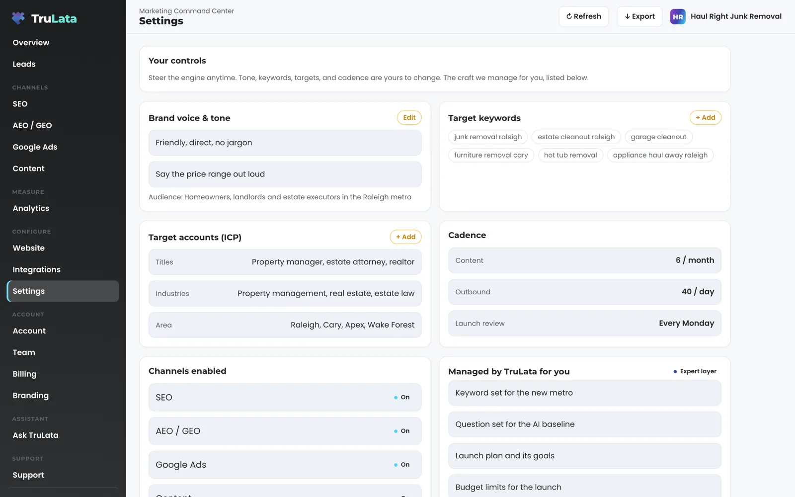 The Settings view for a fictional junk removal company entering Raleigh: brand voice, target keywords such as junk removal raleigh and estate cleanout raleigh, target accounts by title, industry and area, cadence, and the channels enabled.